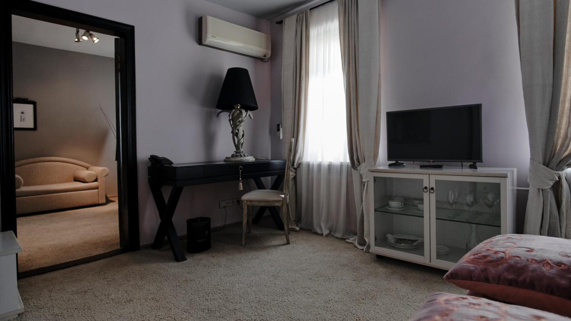 Vozdvyzhensky Boutique Hotel Kyjev Pokoj fotografie